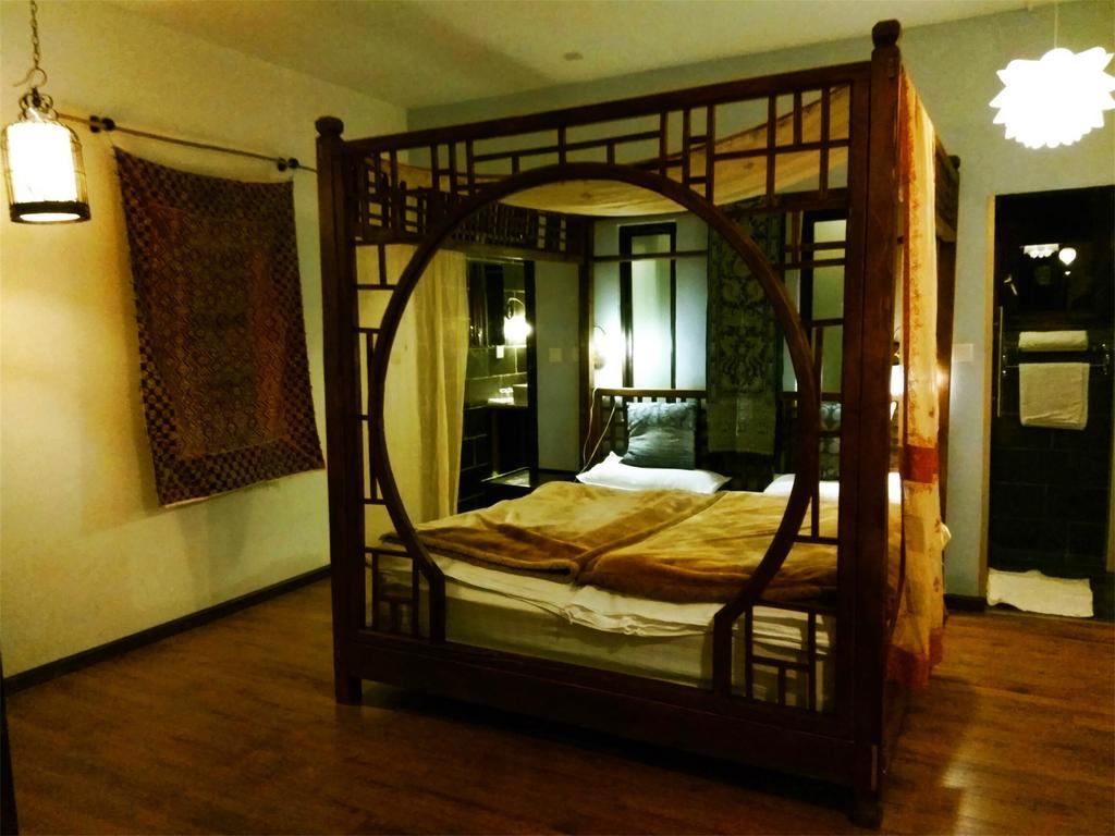 Lijiang Baisha Free Time Designed Hotel Exterior foto