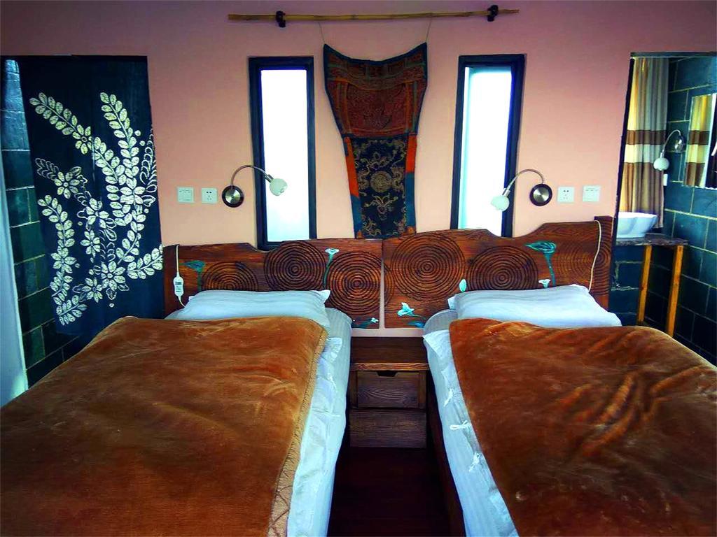 Lijiang Baisha Free Time Designed Hotel Exterior foto