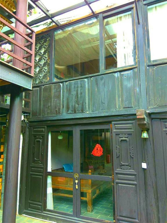 Lijiang Baisha Free Time Designed Hotel Exterior foto